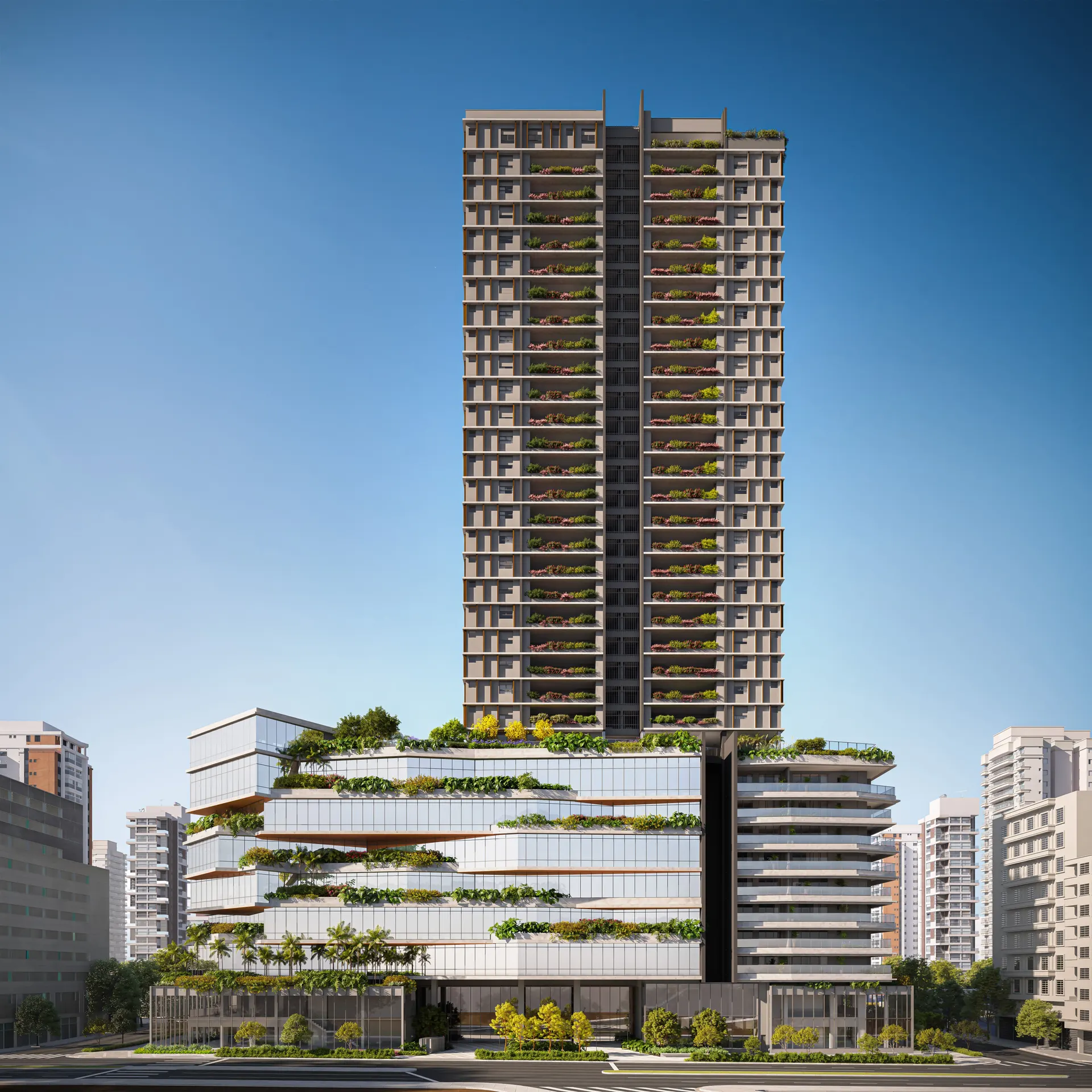 A torre inteira sob o céu azul, com jardineiras em cada andar, sobre uma base escalonada de terraços verdes, entre os prédios da Av. Santo Amaro.