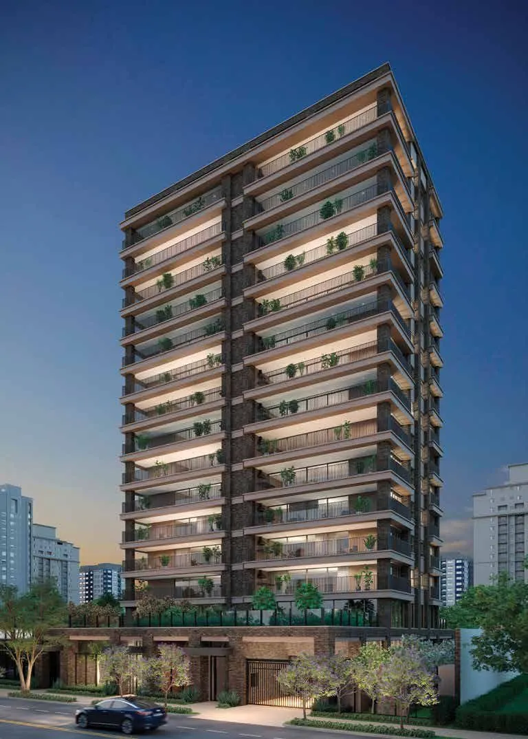 A torre inteira ao entardecer: os terraços em faixas horizontais escuras subindo sobre a base de tijolo, entre árvores e os prédios do bairro.