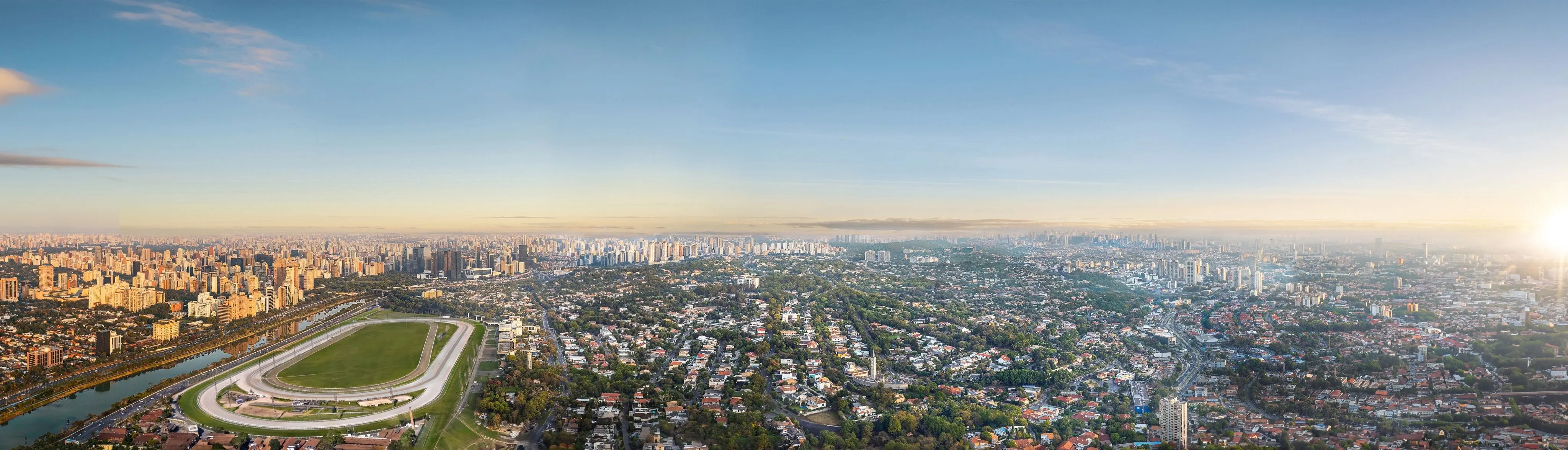 Perspectiva ilustrada da vista a partir do Vista ao amanhecer: o Jockey Club e o Rio Pinheiros em primeiro plano, o Jardim Guedala arborizado à direita e a cidade até o horizonte.